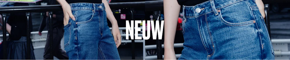 Svart fetstilt text "NEUW" på vit bakgrund, logotyp för varumärket Neuw Denim.